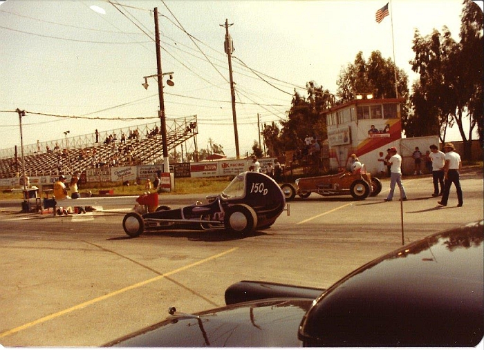  Ed Cortopassi with Glass Slipper in near lane, Art Chrisman's #25 dragster in far lane